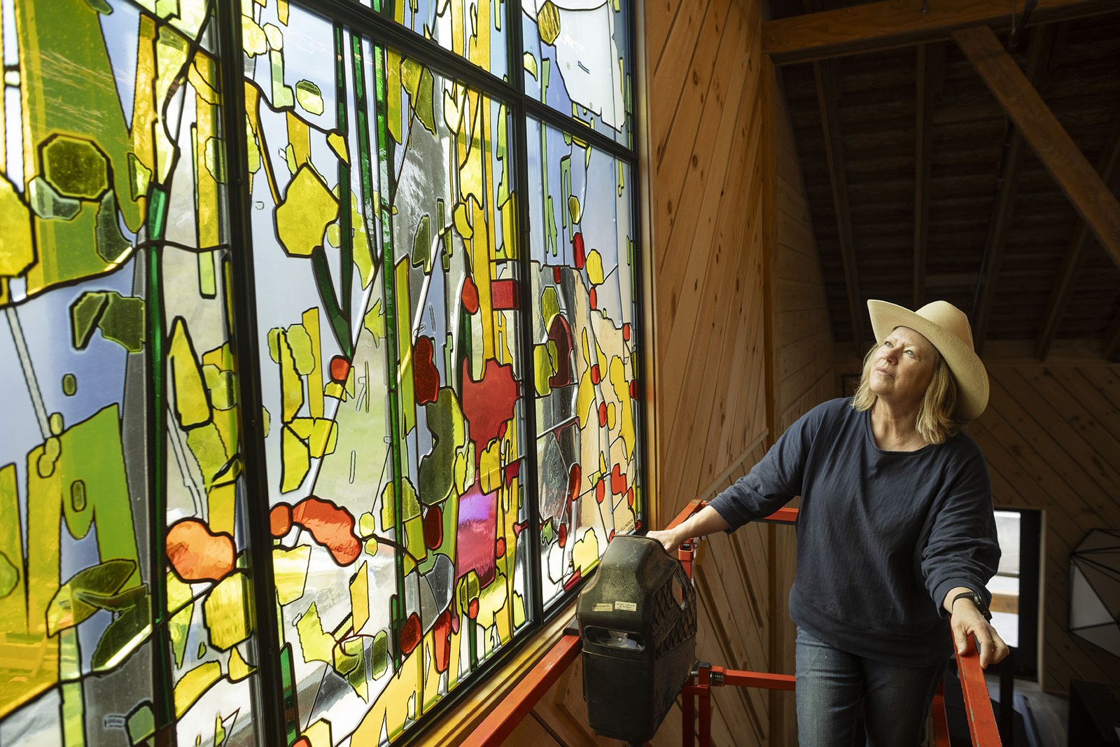 Amy Ellingson inspecting Fenestra Molendini during installation